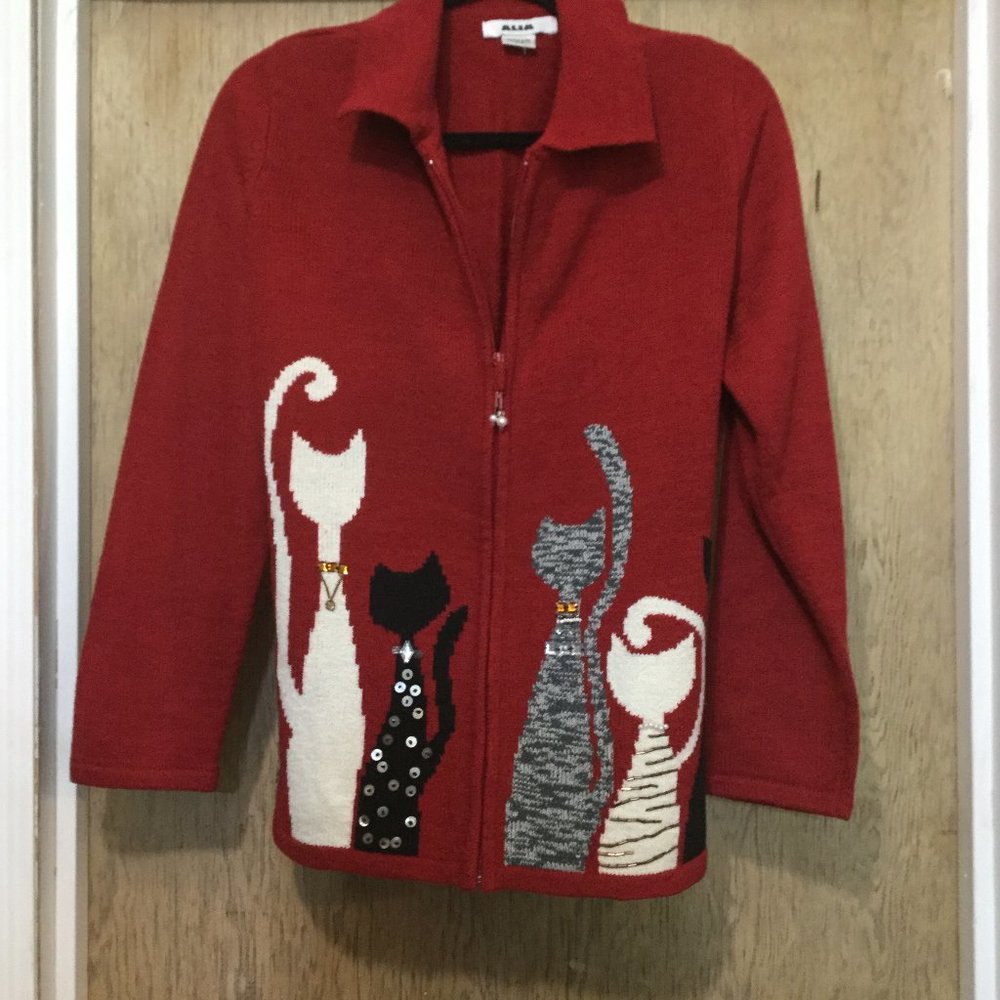 Alia zip front graphic cat sweater size small has the replacement stones still
